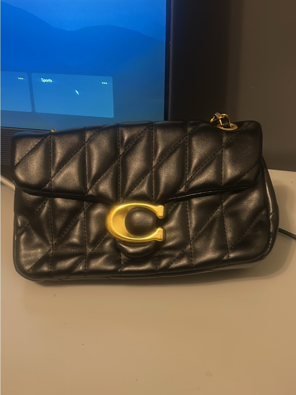 Coach Black Quilted Shoulder Bag with Gold 'C' Hardware